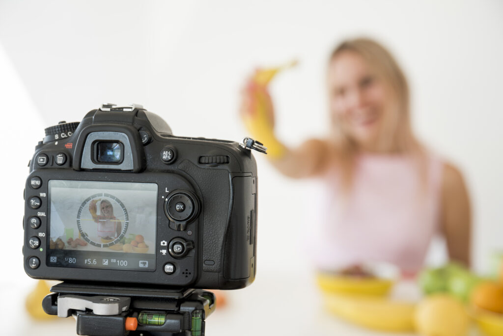blonde influencer recording nutrition food